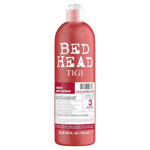 Red shampoo bottle with 'Bed Head' and 'Tigi' branding on a white background