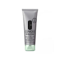 Clinique All About Clean 2-In-1 Charcoal Mask and Scrub in a white jar with black lid, showcasing the skincare product.