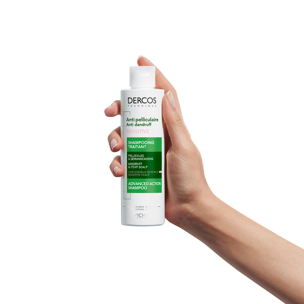 Vichy Dercos Anti-Dandruff Sensitive Shampoo in a white bottle with blue cap, designed for delicate scalp care.