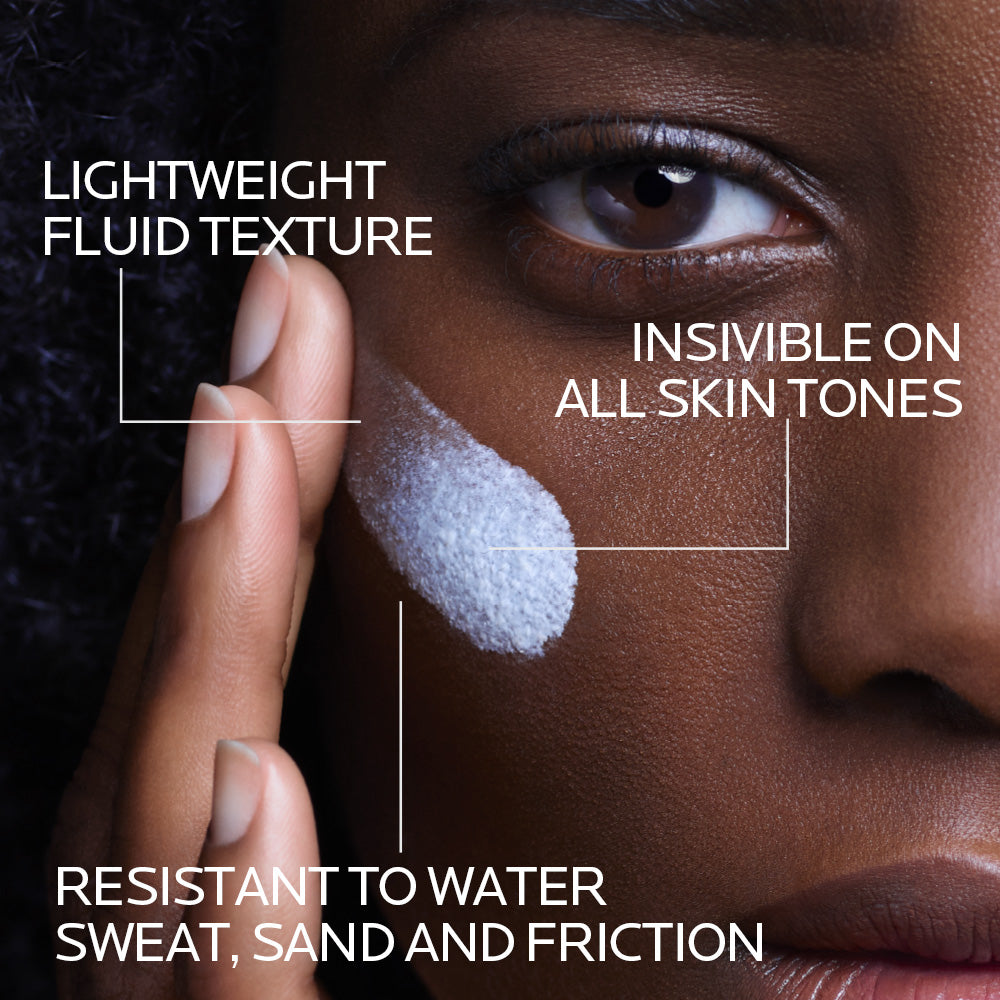 La Roche-Posay Anthelios Anti-Dark Spots Fluid SPF50+ sunscreen bottle against a clean background