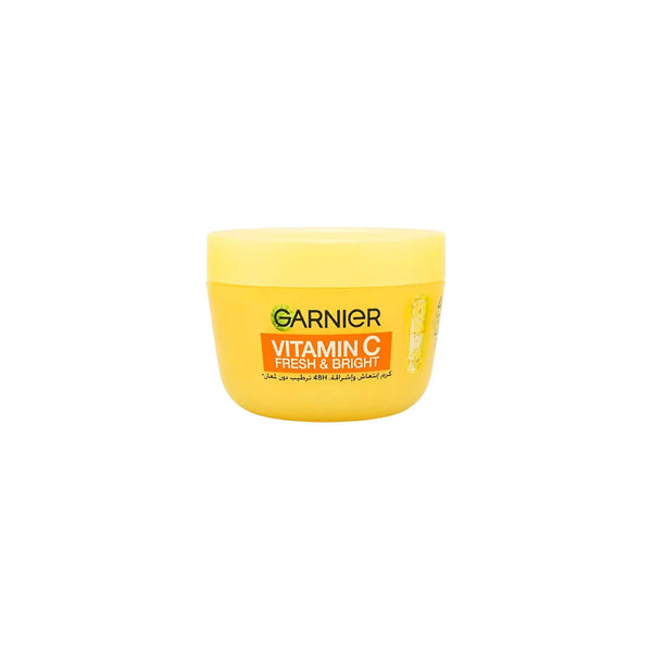Garnier Fresh & Bright creams jar with white lid and vibrant packaging, showcasing skincare product for a radiant complexion