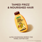 Garnier Ultra Doux Avocado & Shea Butter Shampoo bottle for casual hair care, with natural ingredients and nourishing formula.