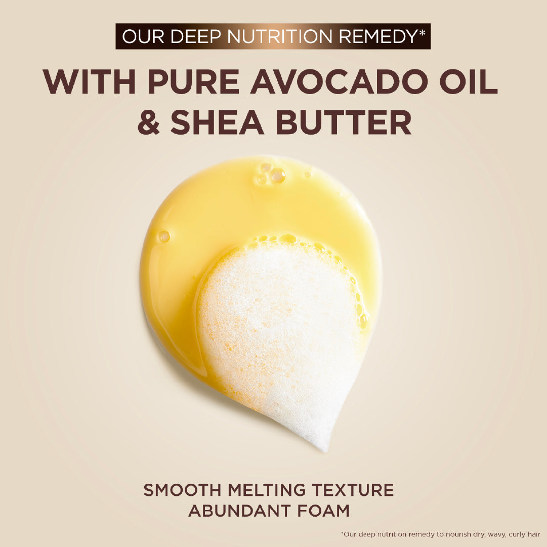 Garnier Ultra Doux Avocado and Shea Butter Shampoo bottle for casual hair care, with a focus on natural ingredients and hydrating formula.