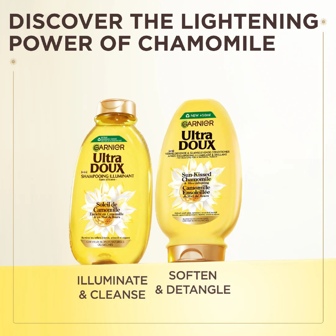 Garnier Ultra Doux chamomile and flower honey illuminating shampoo bottle for casual hair care, with a natural, nourishing formula.