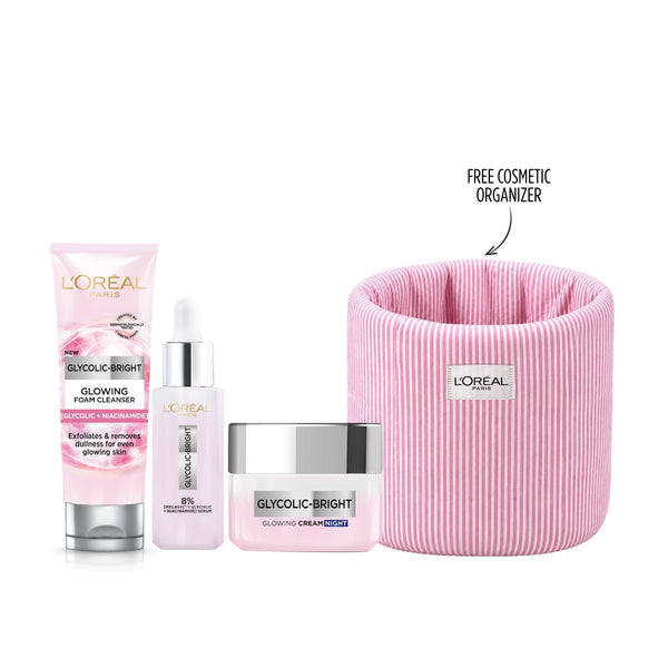 L'Oréal Paris skincare bundle with glycolic bright wash, Melasyl serum, and night cream on white background.