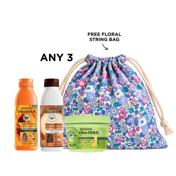 Garnier Hair Food shampoo and conditioner with jar, natural ingredients for nourishing and revitalizing hair care.