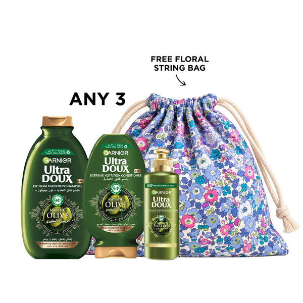 Garnier hair care set with shampoo, conditioner, and leave-in treatment in a sleek bottle, designed for healthy, shiny hair.