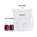 Two Essie nail polishes in white and pink bottles, displayed with a gift box on a white background.