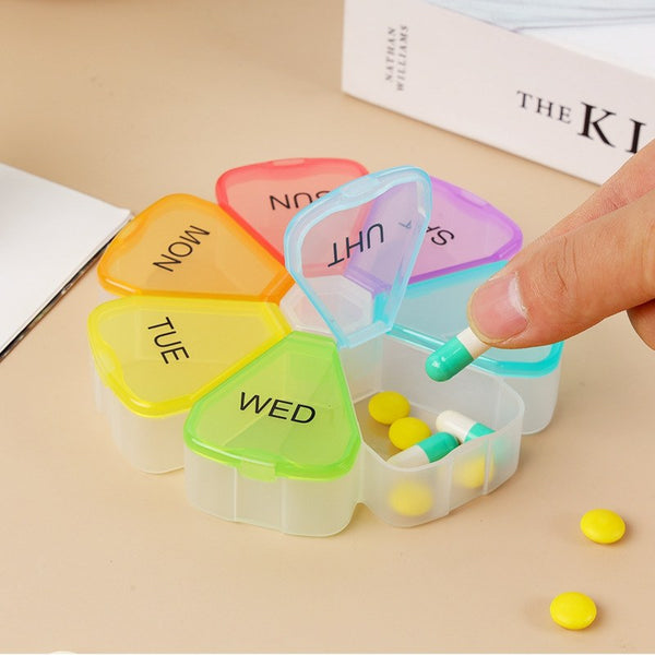 AB Care Flower Week 7 Weekly Pill Organizer in vibrant design with seven compartments for medication management.