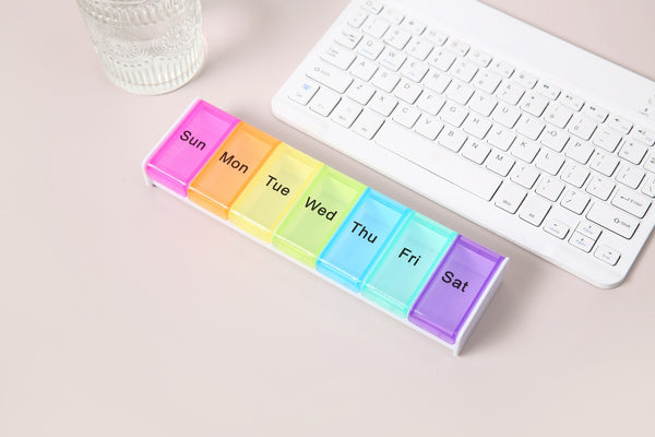 AB Care TowerWeek 7 Weekly Pill Organizer with seven compartments for easy medication management, designed for daily use.