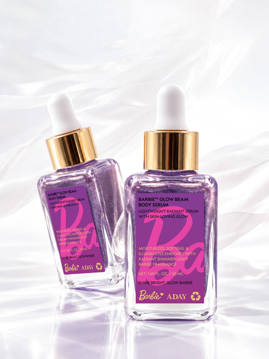 Front and back of the ADAY x Barbie Glow Beam Body Serum bottle showing the label