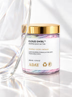 ADAY Cloud Swirl Whipped Body Butter, a 200 ml clear jar with a gold lid