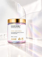 ADAY Cloud Swirl Whipped Body Butter against an iridescent backdrop