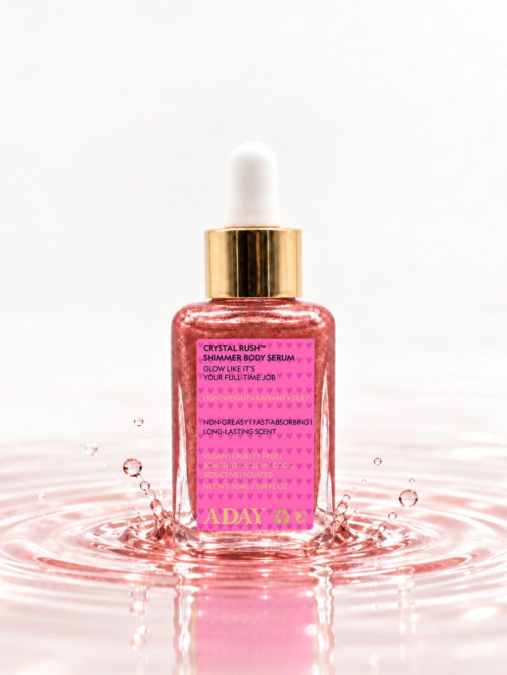 ADAY Crystal Rush Shimmer Body Serum standing in a splash of pink water