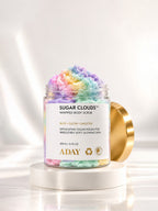 ADAY Sugar Clouds Whipped Body Scrub open on a white pedestal, showing the swirled sugar polish