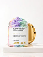 ADAY Sugar Clouds Whipped Body Scrub open with the gold lid resting behind it