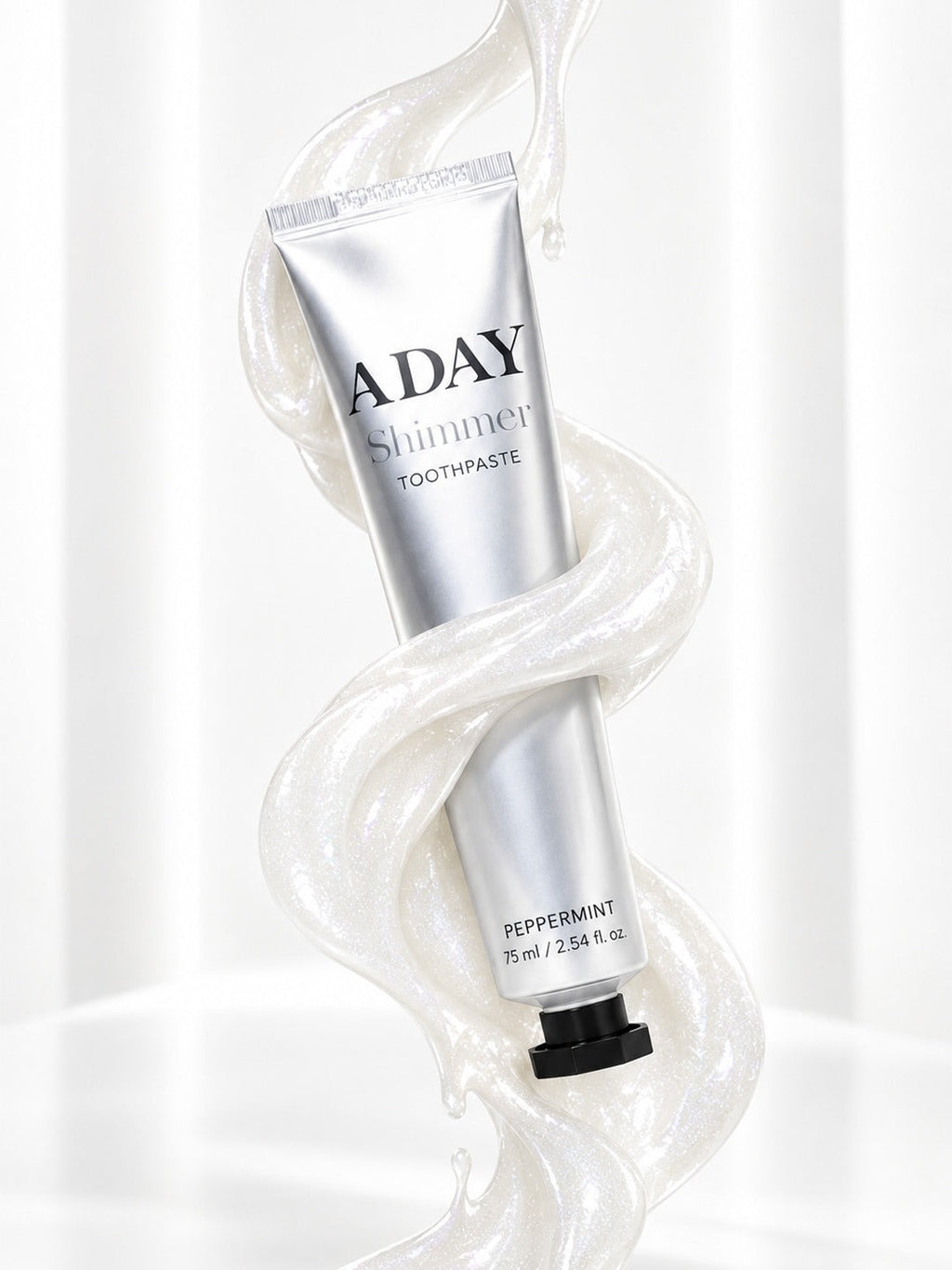 ADAY Silver Shimmer Toothpaste with a swirl of pearly paste around the tube