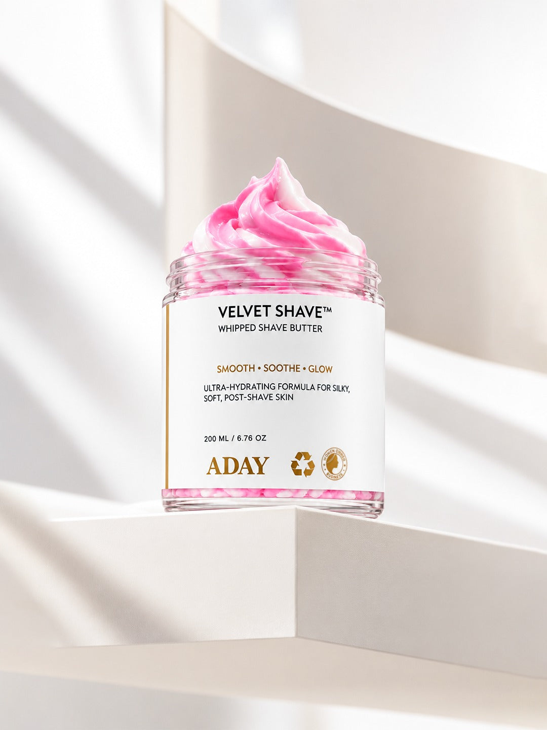 ADAY Velvet Shave Whipped Shave Butter, a 200 ml jar topped with a pink and white whipped peak