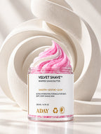 ADAY Velvet Shave Whipped Shave Butter in front of sculptural white arches