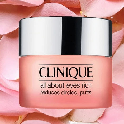 Clinique All About Eyes luxury skincare cream for all skin types, featuring a rich, soothing eye treatment in a sleek jar.